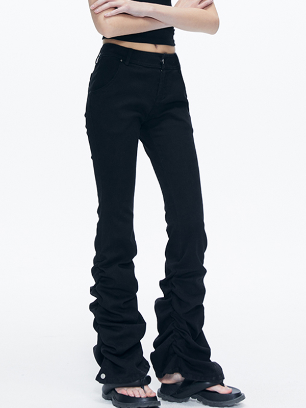 Schwarze Schlagjeans mit Falten-3